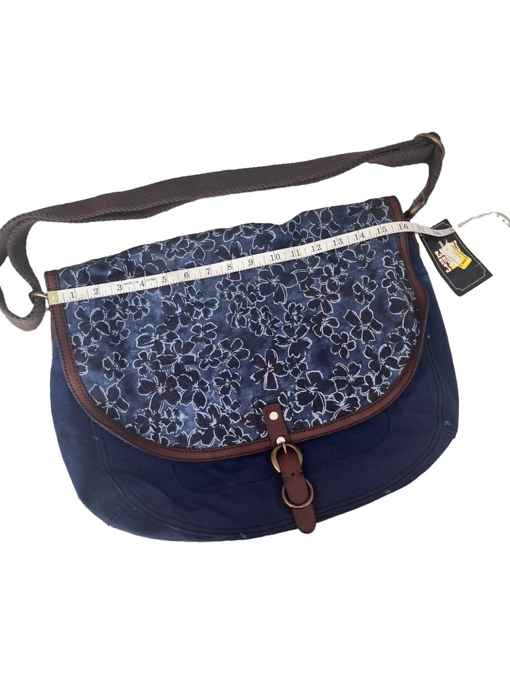 Lucky Brand Navy Floral Canvas Messenger Bag with Brown Trim